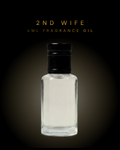2nd Wife 6ml Fragrance Oil is a warm, sensual amber floral scent with pear, jasmine, vanilla, caramel, and musk. Designer-inspired luxury fragrance oil.